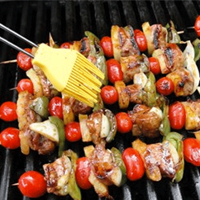 cookout catering chicken kabobs with cherry tomato and bell peppers